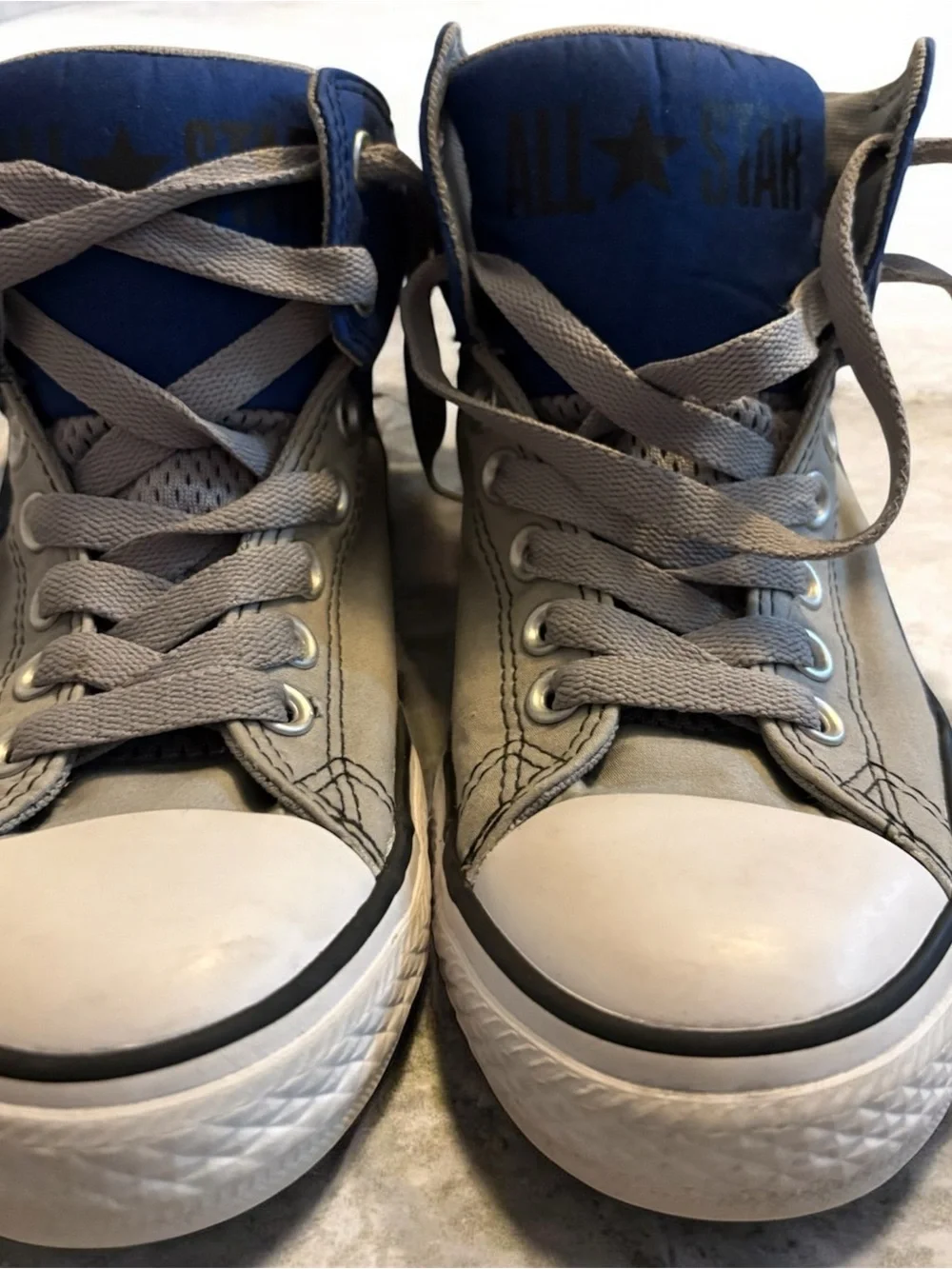 Converse Kids Gray & Blue High-Top Sneakers with puffed top.